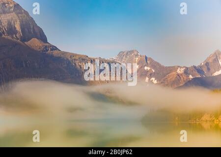 Foggy morning from the shore of Berg Lake, in front of Hargreaves Shelter, in Mount Robson Provincial Park, British Columbia, Canada Stock Photo