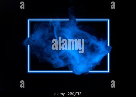 Abstract neon light smoke effect with neon frame on black background. Smoke cloud explosion. Stock Photo