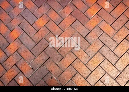 Red, gorgeous, rectangular ceramic clinker tile for patio or sidewalk Stock Photo