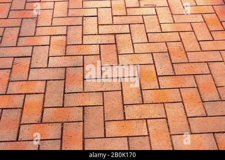 Red, gorgeous, rectangular ceramic clinker tile for patio or sidewalk Stock Photo