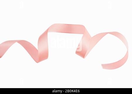A Pink ribbon on a white background. Stock Photo