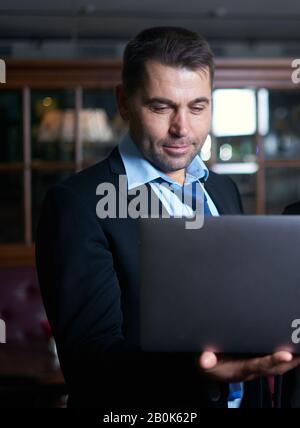 business man working with documents and laptop Stock Photo