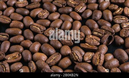 close-up, coffee grains on a black background Stock Photo