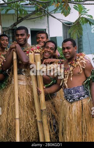 FIJI, VITI LEVU ISLAND, VISEISEI VILLAGE, MEN IN TRADITIONAL COSTUMES Stock Photo