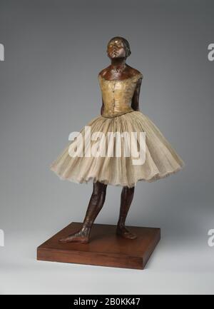 Edgar Degas, The Little Fourteen-Year-Old Dancer, French, Paris, Edgar Degas (French, Paris 1834–1917 Paris), 1922 (cast), 2018 (tutu), French, Paris, Partially tinted bronze, cotton tarlatan, silk satin, and wood, Overall: H. 38 1/2 x W. 17 1/4 x D. 14 3/8 in. (97.8 x 43.8 x 36.5 cm) [n.b.: fluffiness of skirt skews measurement], Sculpture-Bronze Stock Photo