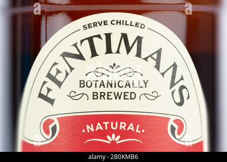 A close up of the brand logo as seen on a bottle of Fentimans Ginger Beer shot on a white background. Stock Photo