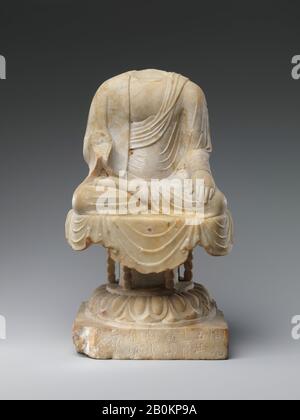 Buddha, China, Tang dynasty (618–907), Date dated 717, China, Marble, H. 12 1/8 in. (30.8 cm); W. 7 1/4 in. (18.4 cm); D. 6 in. (15.2 cm), Sculpture Stock Photo