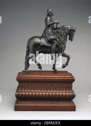 Possibly after a model by Pietro Tacca, Equestrian statuette of Philip IV, King of Spain (1605–1665), Italian, Possibly after a model by Pietro Tacca (Italian, Carrara 1577–1640 Florence), 17th century, cast possibly 19th century, Italian, Bronze, Horse and rider: 16 1/8 × 7 × 12 5/8 in. (41 × 17.8 × 32.1 cm), Rider (a): 12 3/8 × 7 × 5 1/8 in. (31.4 × 17.8 × 13 cm), Horse (b): 12 × 5 5/8 × 12 5/8 in. (30.5 × 14.3 × 32.1 cm), Base: 9 × 7 3/4 × 15 in. (22.9 × 19.7 × 38.1 cm), Sculpture-Bronze Stock Photo