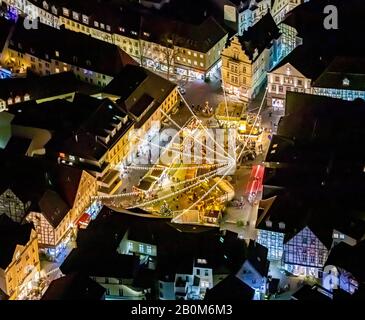 Aerial photo flight over the nocturnal Unna,market, market place of the city of Unna, Christmas market with Christmas lighting, lamp garlands, Unna, R Stock Photo