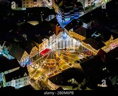 Aerial photo flight over the nocturnal Unna,market, market place of the city of Unna, Christmas market with Christmas lighting, lamp garlands, Unna, R Stock Photo