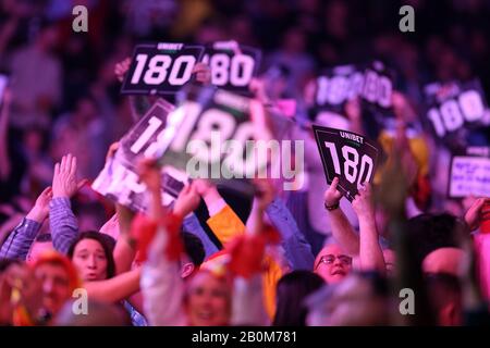 Cardiff UK. 20th Feb 2020. Darts fans are seen during the 2020 Unibet Premier League Darts night three event at the Motorpoint Arena in Cardiff South Wales on Thursday 20th February 2020
