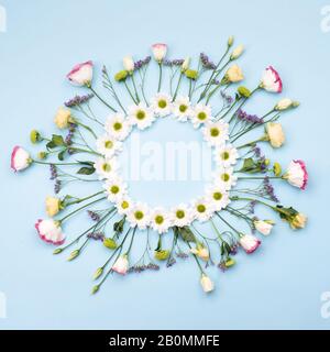 Beautiful flowers composition. Wreath made of white flowers. spaceValentines Day, Happy Women's Day, Mother's Day. Flat lay, top view, copy Stock Photo