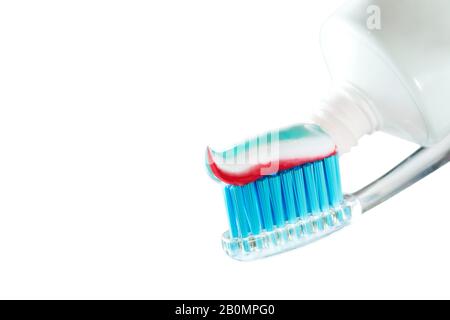 Toothbrush and toothpaste on blurred background. care for the oral cavity and teet Stock Photo