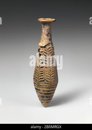 Glass alabastron (perfume bottle), Greek, Eastern Mediterranean, Late Hellenistic, Date 2nd–mid-1st century B.C., Greek, Eastern Mediterranean, Glass; core-formed, Group III, Overall: 5 3/16 x 1 5/8in. (13.2 x 4.1cm), Glass Stock Photo