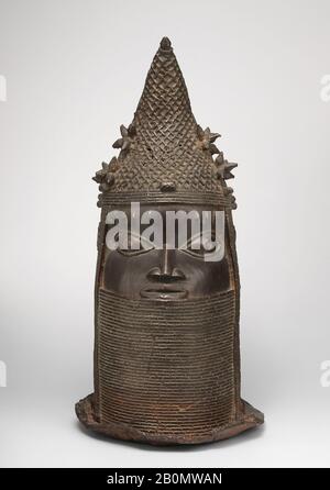 Head of Iyoba, Edo peoples, 18th–19th century, Nigeria, Court of Benin, Edo peoples, Brass (cast), iron, H. 21 in. × W. 10 1/2 in. × D. 10 3/4 in. (53.3 × 26.7 × 27.3 cm), Metal-Sculpture Stock Photo
