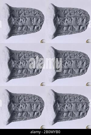 Votive cone with cuneiform inscription of Gudea, Neo-Sumerian, Neo-Sumerian, Date ca. 2090 B.C., Mesopotamia, probably from Girsu (modern Tello), Neo-Sumerian, Clay, Head: 1 7/8 in. (4.7 cm), Top: 4 3/4 in. (12.1 cm), End: 4 3/8 in. (11 cm), Body: 1 5/8 in. (4.2 cm), Total: 2 1/8 in. (5.3 cm), Clay-Tablets-Inscribed Stock Photo