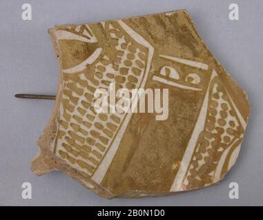 Fragment, 9th century, Attributed to Iraq, composite body; opaque white tin glaze; luster-painted, Ceramics Stock Photo