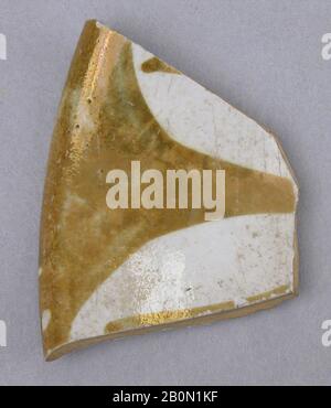 Fragment, 9th century, Attributed to Iraq, Earthenware; glazed, luster painted, Ceramics Stock Photo