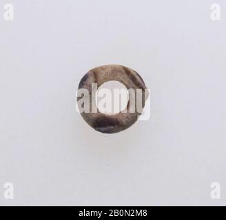 Glass eye bead, Glass, Height: 5/16 x 1/2 in. (0.7 x 1.2 cm), Glass Stock Photo