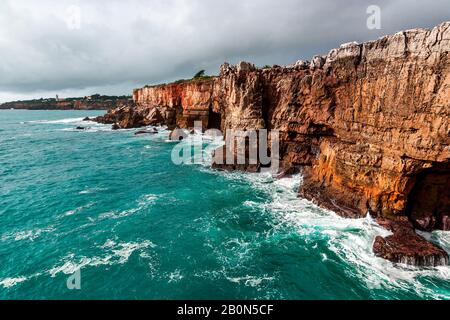 Rocks and ocean before the storm. Amazing view at Boca do Inferno, Hell's Mouth – Cascais, Portugal Stock Photo