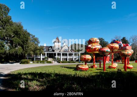 Charleston, SC - February 2 2020: The Plantation home at Magnolia Plantation and Gardens with Chinese lanterns in the foreground Stock Photo