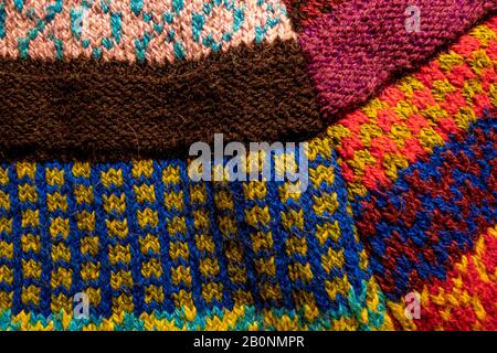 colorful knitted wool textured patchwork fabric background Stock Photo