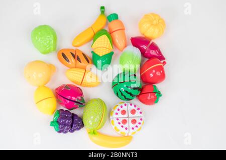 still life image of plastic kids fruit and vegetable toys Stock Photo