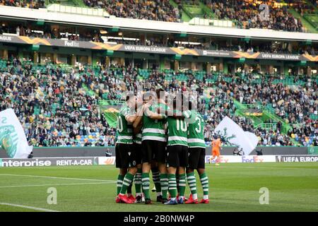 Lisbon, Portugal. 20th Feb, 2020. Players of Sporting CP celebrates after scoring during the UEFA Europa League round of 32 first leg football match between Sporting CP and Istanbul Basaksehir at Alvalade stadium in Lisbon, Portugal, on Feb. 20, 2020. Credit: Pedro Fiuza/Xinhua/Alamy Live News Stock Photo