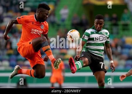 Lisbon, Portugal. 20th Feb, 2020. Carlos Ponck of Istanbul Basaksehir (L) vies with Jovane Cabral of Sporting CP during the UEFA Europa League round of 32 first leg football match between Sporting CP and Istanbul Basaksehir at Alvalade stadium in Lisbon, Portugal, on Feb. 20, 2020. Credit: Pedro Fiuza/Xinhua/Alamy Live News Stock Photo