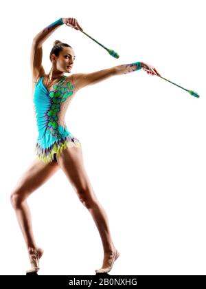 one caucasian young woman gymnast practicing rhythm gymnastic  in studio silhouette   isolated on white background Stock Photo