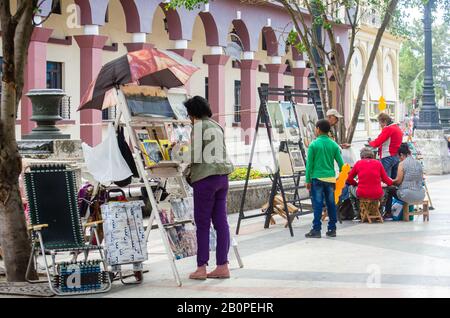 Art Market in Paseo de Marti or Paseo Del Prado in Old Havana on Sunday.  Artist sell their paintings and crafts on weekends Stock Photo