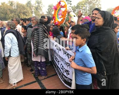 Jamalpur, Bangladesh. 21st Feb, 2020. Thousands of people gather at Jamalpur Language Martyrs' Memorial monument with flowers in homage to the martyrs of the 1952 Bengali Language Movement in Dhaka on February 21, 2020, on International Mother Language Day. (Photo by Ryan Rahman/Pacific Press) Credit: Pacific Press Agency/Alamy Live News Stock Photo