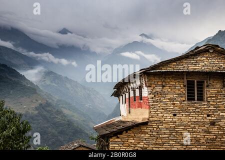 Typical houses in Himalayan mountains in Nepal Stock Photo