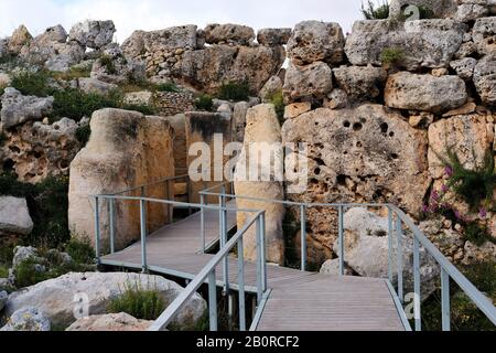 Neolithic limestone gate at the ggantija temples complex in Xaghra in island of Gozo, Malta. Stock Photo