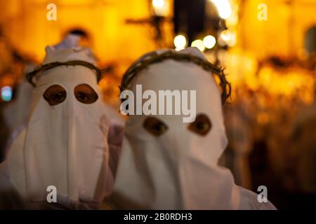 LEONFORTE, SICILY - APRIL, 19: Christian brethren during the traditional Good Friday procession on April 19, 2019 Stock Photo