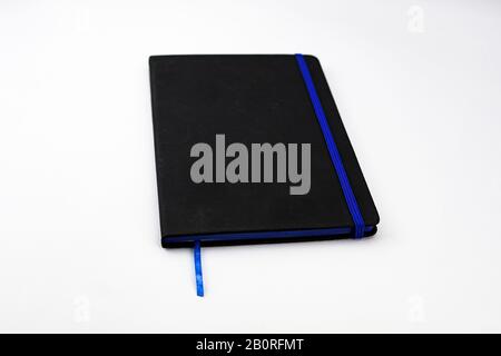 Closed black leather diary with blue trim and separator for mockup as a merchandising product Stock Photo
