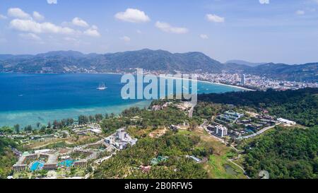 Freedom beach, Phuket, Thailand - January, 2020: Aerial shooting of Freedom beach, Phuket, Thailand. Beautiful tropical island with white sand beach a Stock Photo