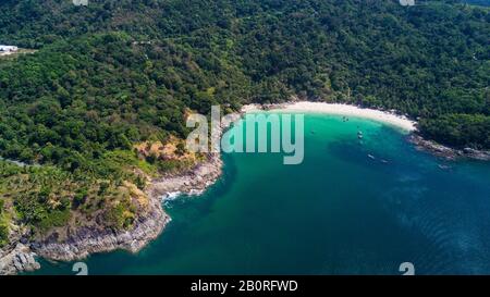 Freedom beach, Phuket, Thailand - January, 2020: Aerial shooting of Freedom beach, Phuket, Thailand. Beautiful tropical island with white sand beach a Stock Photo