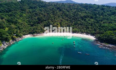 Freedom beach, Phuket, Thailand - January, 2020: Aerial shooting of Freedom beach, Phuket, Thailand. Beautiful tropical island with white sand beach a Stock Photo