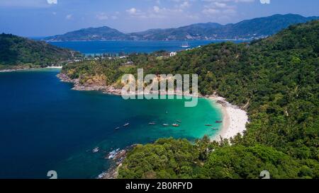 Freedom beach, Phuket, Thailand - January, 2020: Aerial shooting of Freedom beach, Phuket, Thailand. Beautiful tropical island with white sand beach a Stock Photo