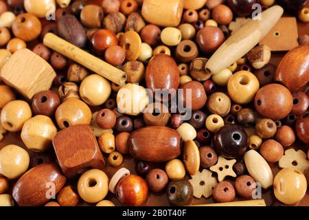 Natural coloured mixed wooden beads close up Stock Photo