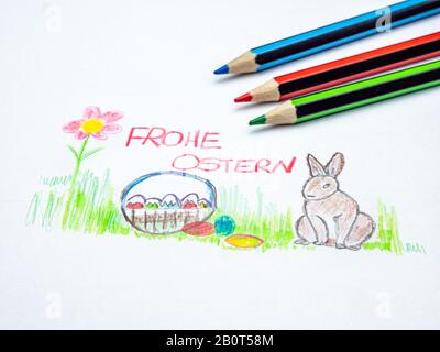 Happy Easter painted with colored pencils in german Stock Photo