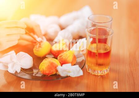 Preparing to Easter, Woman paint and color eggs with the help of napkins. Stock Photo