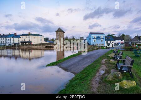 Record breaking high river levels threaten to ovewhelm the historic Monnow bridge, at Monmouth in South Wales. February 2020. Stock Photo
