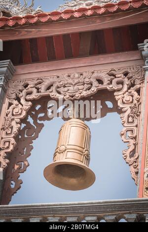 Typical bell tower outdoor instrument, ancient bell and gazebo in the pagoda in Vietnam Stock Photo