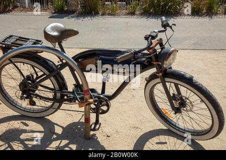 Rocker at show standing in front of british bikes Stock Photo - Alamy