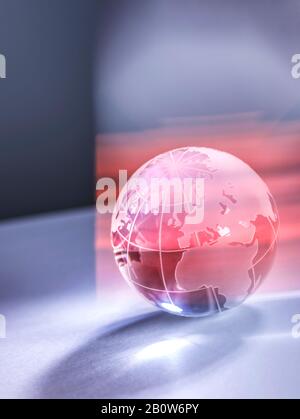 A glass globe of planet Earth illustrating global warming. Stock Photo