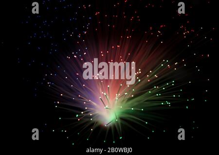 Connecting the dots fibre optical cables provide fast effective data transmission on networks for telecoms computing with laser light Stock Photo