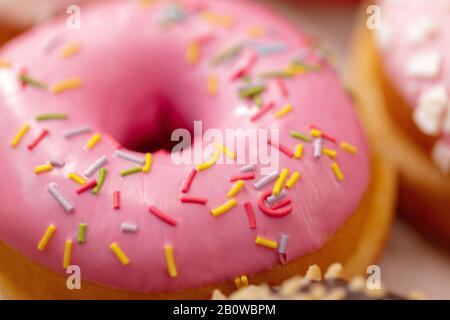 Assorted sweet donuts. close up. creative photo. Stock Photo