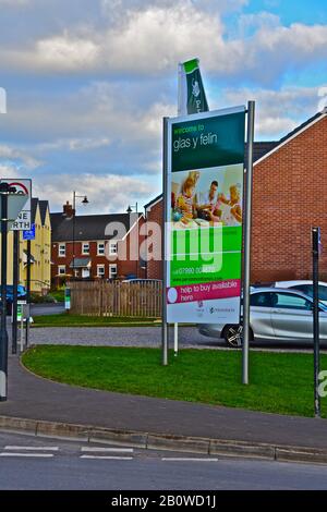 'Welcome to Glas y Felin' sign advertising new homes for sale by Persimmon Homes, at Coity on the outskirts of Bridgend. Stock Photo